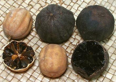 Whole and Cut Dried Limes, Tan and Black