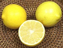 Whole and Cut Sweet Lemons