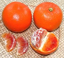 Whole and Partially Peeled Ruby Tango Mandarins