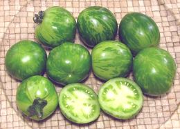 Whole and Cut Green Zebra Tomatoes