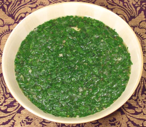 Bowl of Chicken Molokhiya Soup