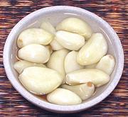 Bowl of Pickled Garlic Clovess