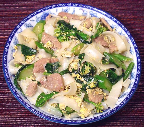 Dish of Pork with Broccoli and Rice Noodles