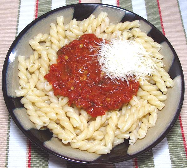Dish of Pasta with Tomato Pine Nut Sauce