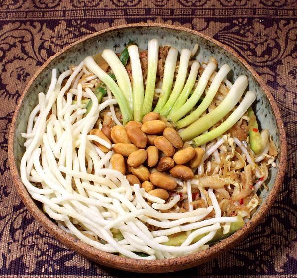 Bowl of Tart Salad with Peanut Dressing